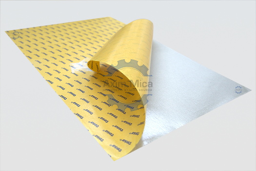 Peeling the protective release liner off adhesive-backed mica tape for quick installation