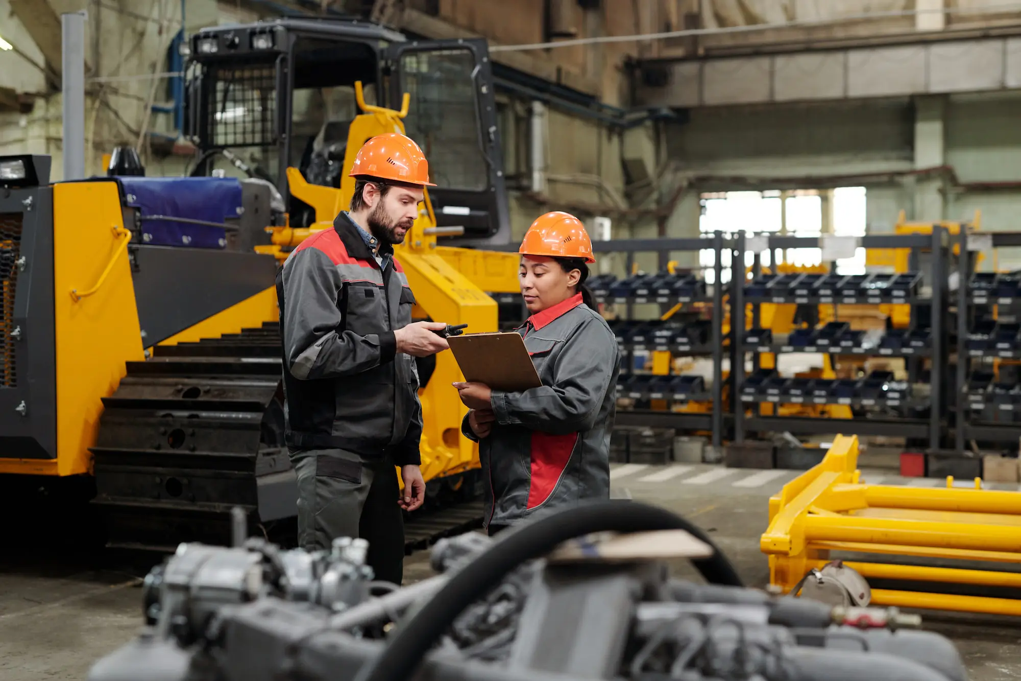 Axim Mica manufacturing team reviewing insulation production data